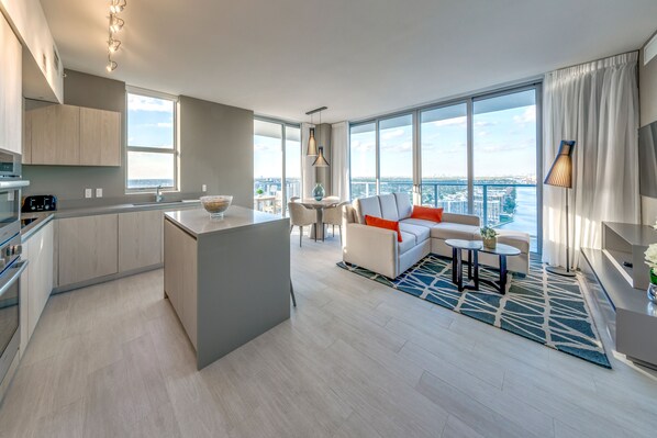 Our gorgeous Condo... you can cook, watch TV and have fun at the same time and if you get bored take a look at that view!