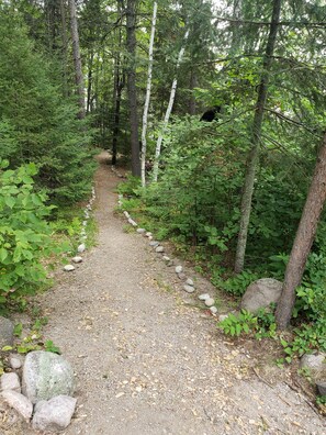 View from parking area.  Come on down path through rock lined path.  Private!