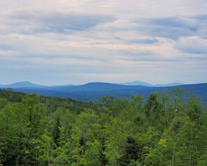 Panoramic views of mountain peaks to 90 miles.