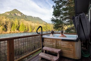 Amazing riverfront view from the hot tub!