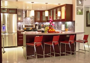 Your lavish kitchen and dining.