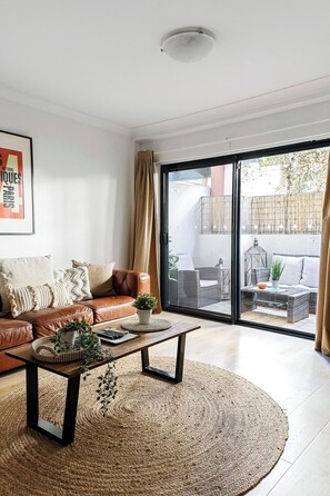 Beautiful lounge room with a view to the out door sitting area