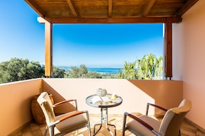 The balconies are equipped with patio furniture.
