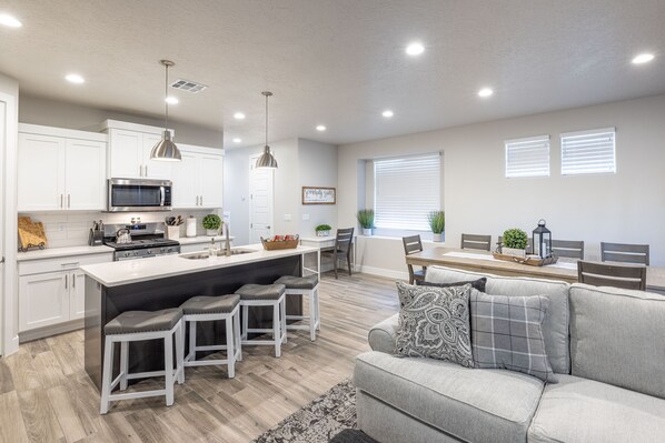 Kitchen Island - The Kitchen Island comfortably seats 4 adults and creates a great space for serving and preparing meals.