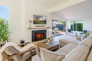 Open living room area with fireplace