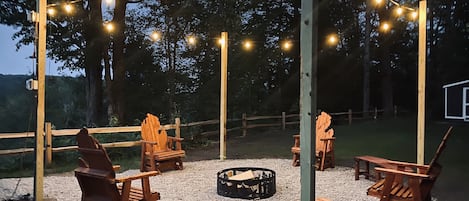 Lighted Firepit with seating.