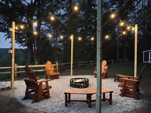 Lighted Firepit with seating.