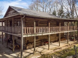 From the front of the home you are only able to see two of the decks, however, the back side of the home boasts 4 covered porches! 