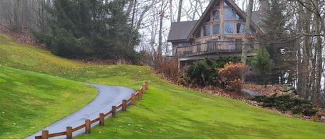 The home sits atop the golf course looking down the iconic greens of Mountain Air Golf Club