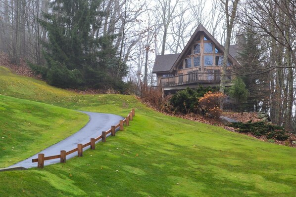 The home sits atop the golf course looking down the iconic greens of Mountain Air Golf Club