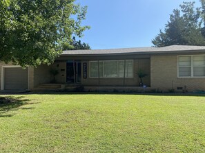 Front of our Home at the12th Green at Duncan Golf Course