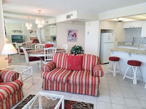 The living room offers a queen sized sofa sleeper and matching love seat