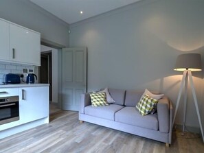 Kitchen, sofa and lamp