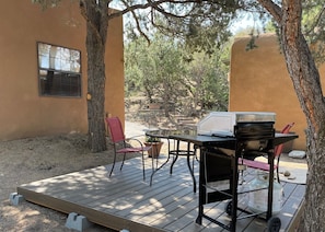 New: an outside patio under the trees with barbeque for your exclusive use