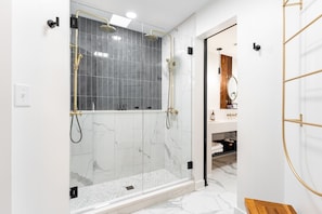 Double rainwater showerheads await in this luxury shower.