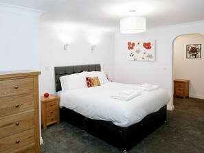 apartment 2, master bedroom with bunkbeds through arch way