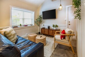 Living room, sofa bed and 55" smart TV