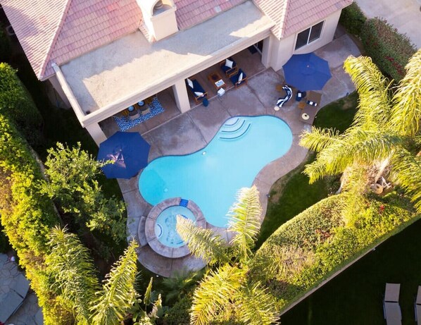 Backyard nestled in complete privacy with an amazing pool