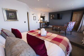 Relax in the 6 foot wide super king bed and enjoy the 55" Smart TV