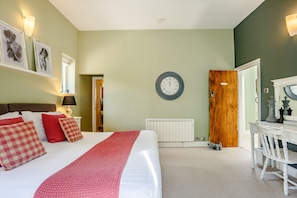 The spacious  first bedroom in Clock Cottage