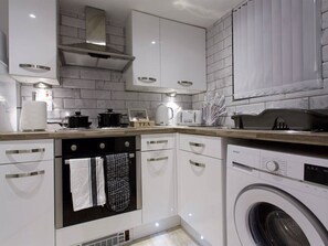 Kitchen in studio apartment 