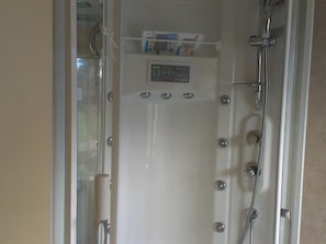 En suite hydromassage steam cabin shower