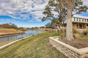 Boat can be docked along the back of the house in the canal.