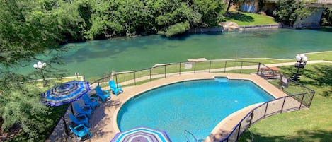 Swimming pool looking over the Comal River!