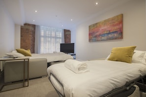 A double and single sofa bed can be made up in the living room allowing a total of 5 guests to stay.