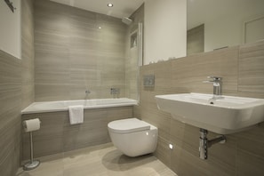 Shower over large bath.