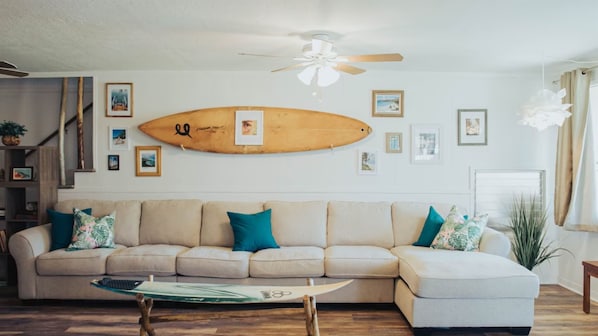 Family Room with a large Sectional Couch (the couch isn't a sleeper sofa, but two children or teens can sleep comfortably on top)