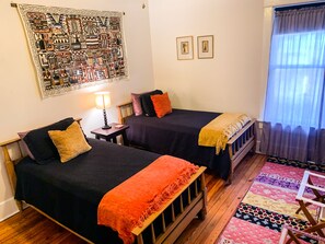 Twin bedroom with Peruvian decor