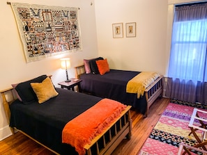 Twin bedroom with Peruvian decor