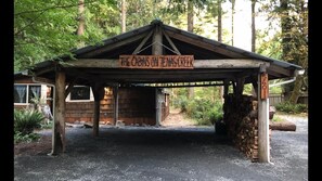 Parking for Fir cabin is to the right of the carport.