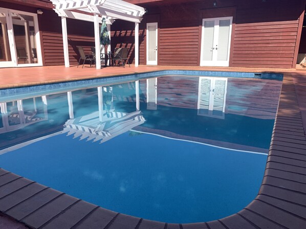Grand pool: ~ 20x35’ surrounded by massive pool deck