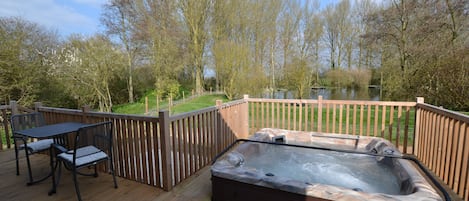 Private veranda with hot tub, BBQ & lake view