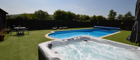 Private seasonally heated pool and year round hot tub (Exclusive to The Pool House)