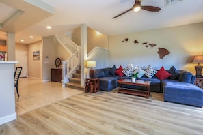 Flush with a spacious living room and floor to ceiling windows with direct access to the wrap-around lanai, this space was designed for entertaining