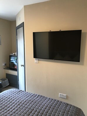  Large smart TV with Netflix and other smart features.