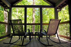 Front covered porch with river views. 