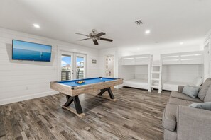 3rd Floor Open Area With Pool Table, Loft Style Bunk Beds, and Sofa Bed