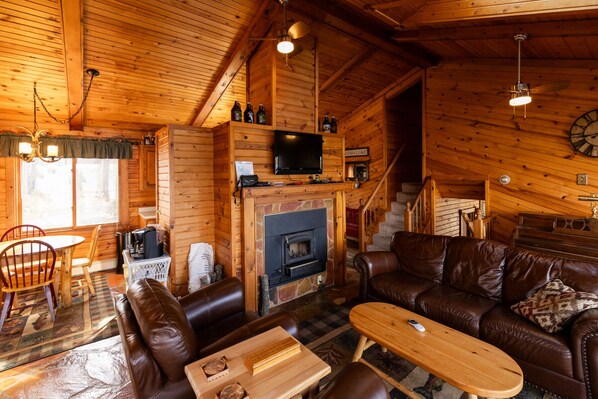 Main living room with the fireplace as the focal point.  DirecTv cable.