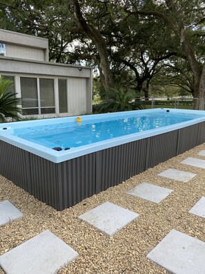 Enjoy this 24ft pool with swim jets and seating around the spa jets