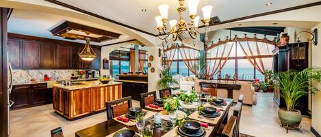 View from dining room into the kitchen and living area 