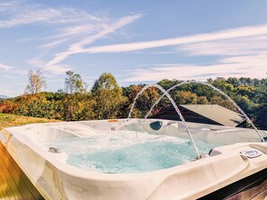 Soak in the mountain views in this brand new, top-of-the-line 6-seater hot tub!