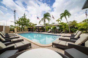 Comfortable sunbeds at the pool