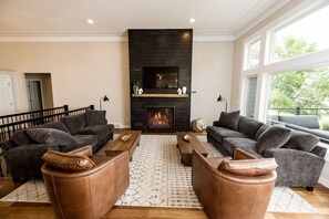Beautifully remodeled living room with expansive lake views