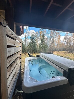 Hot tub outside basement suite.