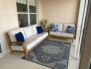Comfy seating on sunbrella teak patio set. 