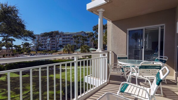 Private balcony with beach views and complex grounds